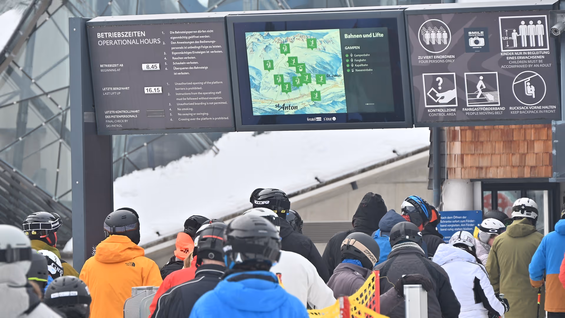 Digital signage banner system with LCD screen for information on cable cars and lifts at Ski Arlberg, St. Anton